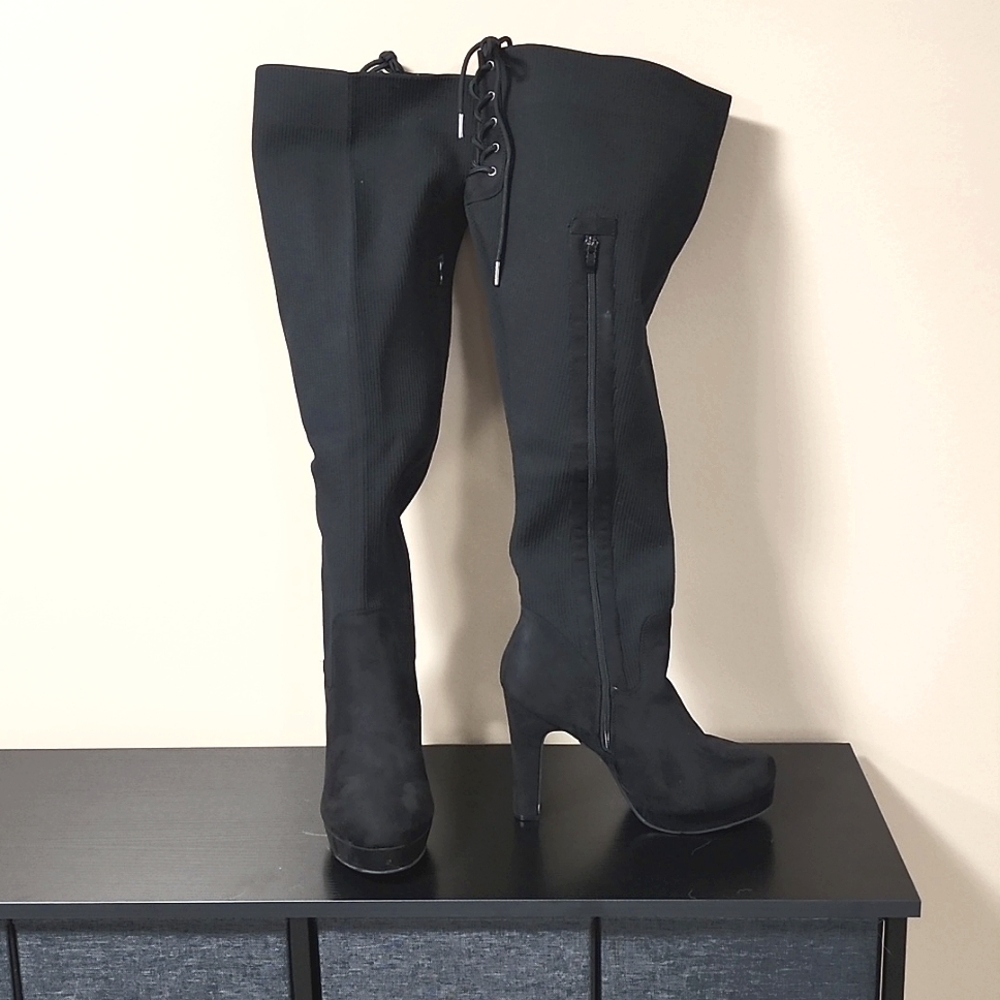 Over the knee black high heeled boots